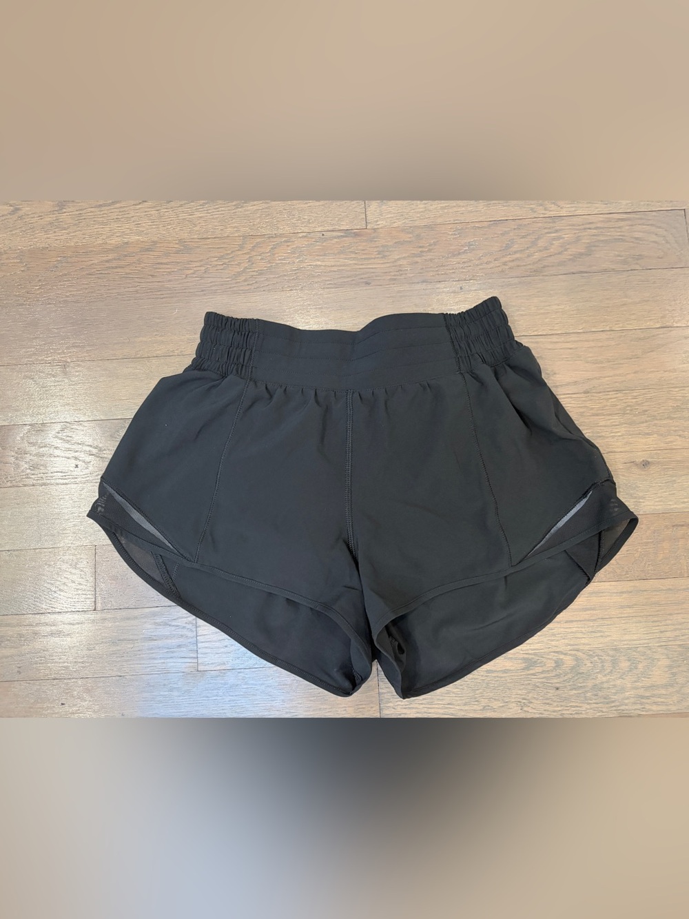 Black lululemon hotty hot shorts. Size 4 high rise + 2.5 inch length